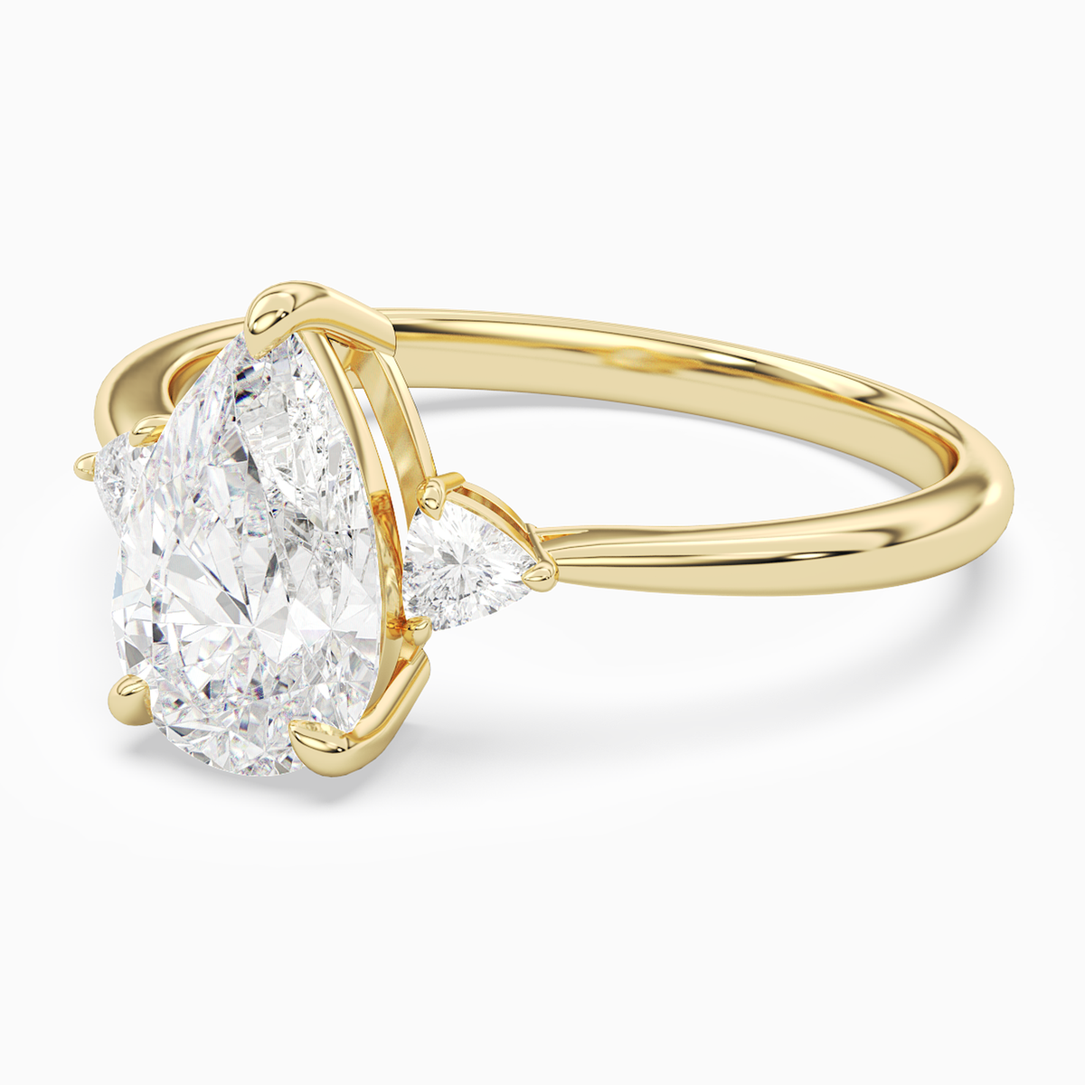 Pear Trillion Three Stone Small Sides in 14K Yellow Gold top angle