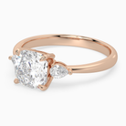 Cushion Pear Side Three Stone Classic in 14K Rose Gold top angle