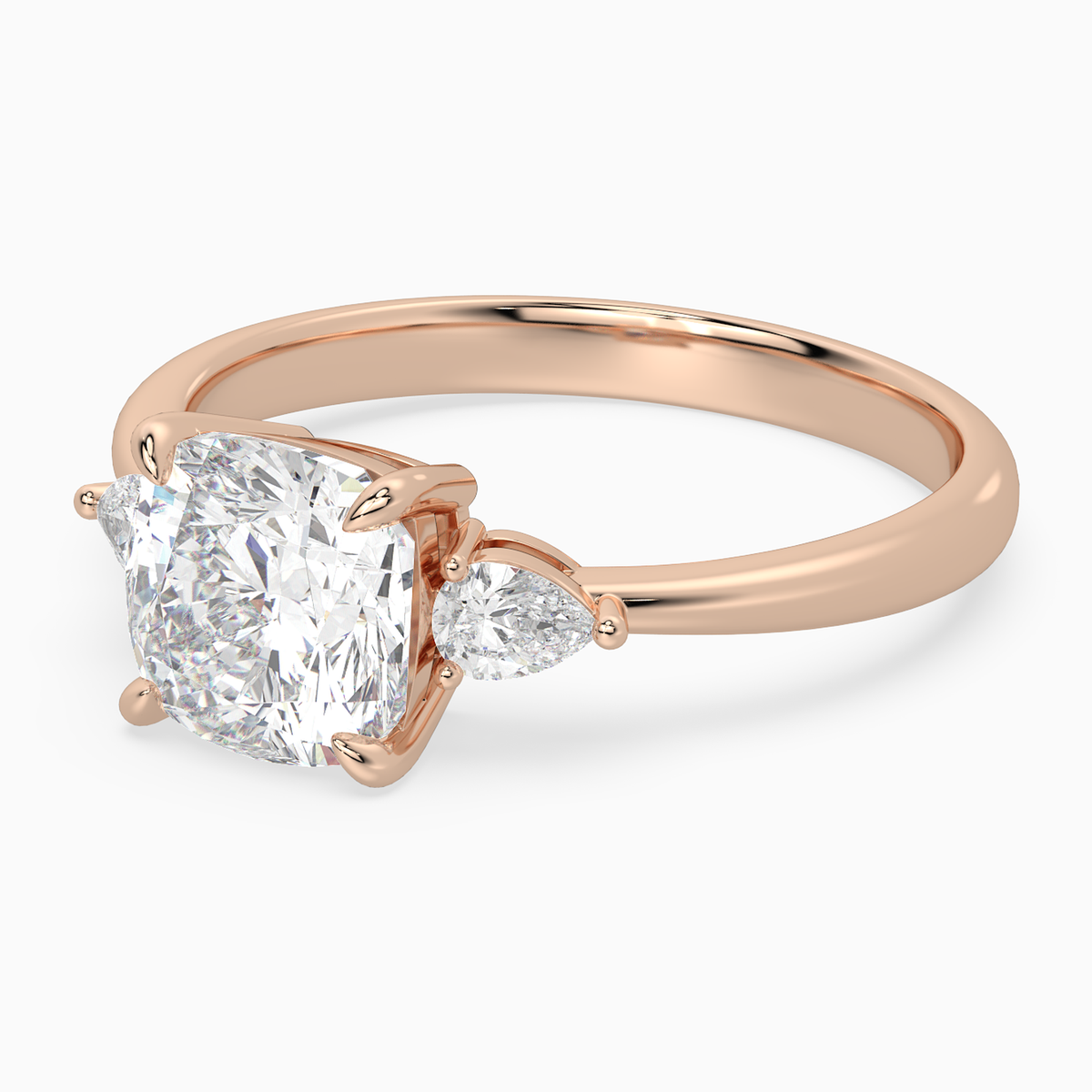 Cushion Pear Side Three Stone Classic in 14K Rose Gold top angle