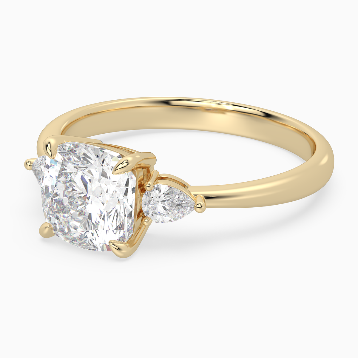 Cushion Pear Side Three Stone Classic in 14K Yellow Gold top angle