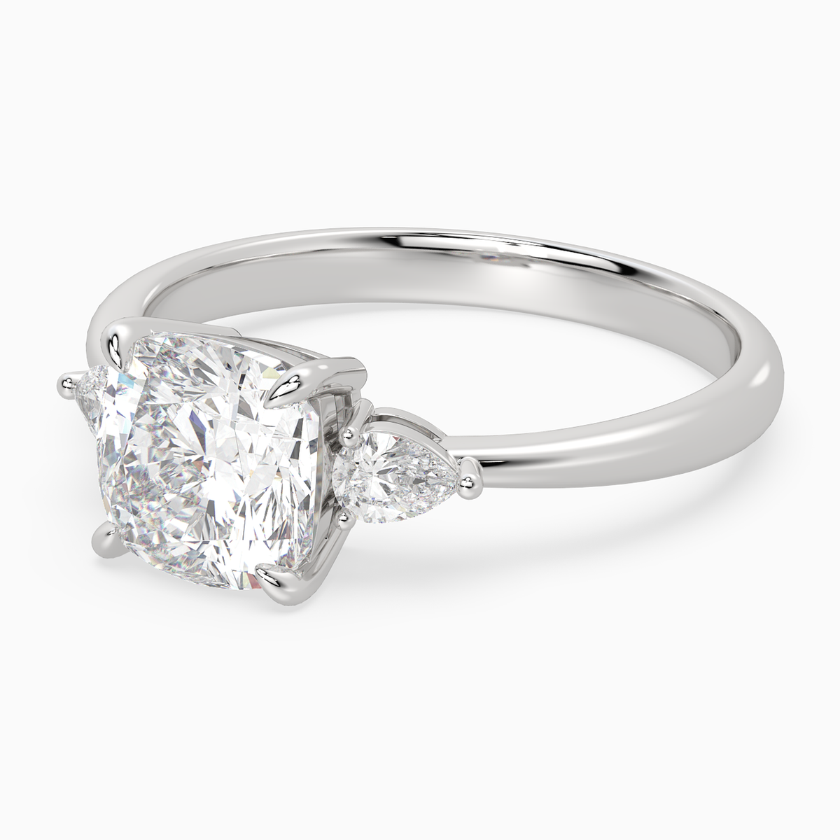 Cushion Pear Side Three Stone Classic in Platinum top angle
