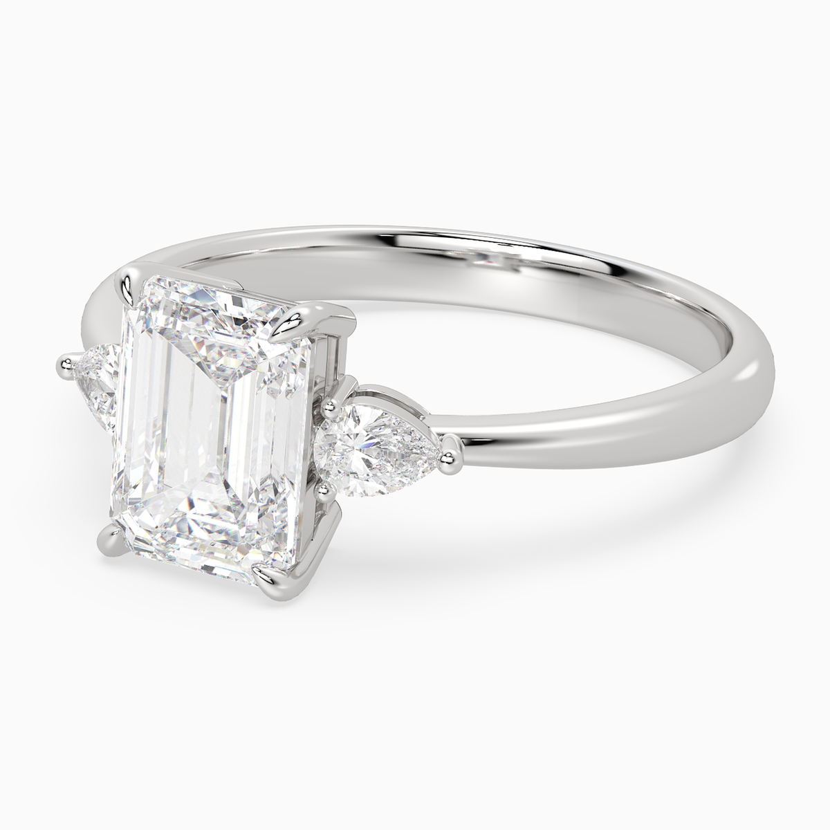Emerald Pear Side Three Stone Classic in 14K White Gold top angle
