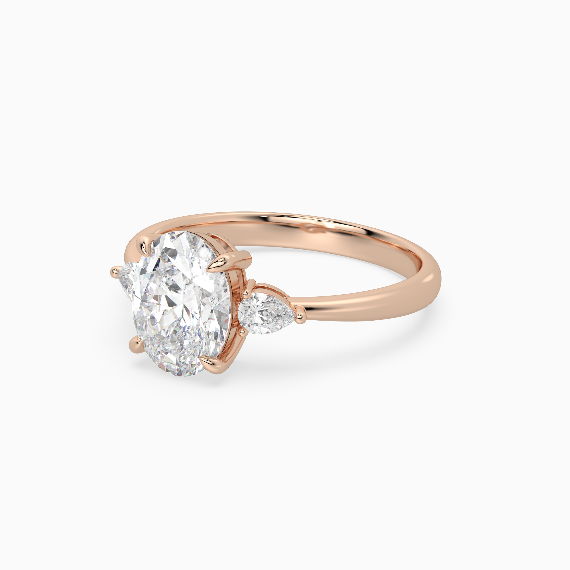 Oval Pear Side Three Stone Classic in 14K Rose Gold top angle
