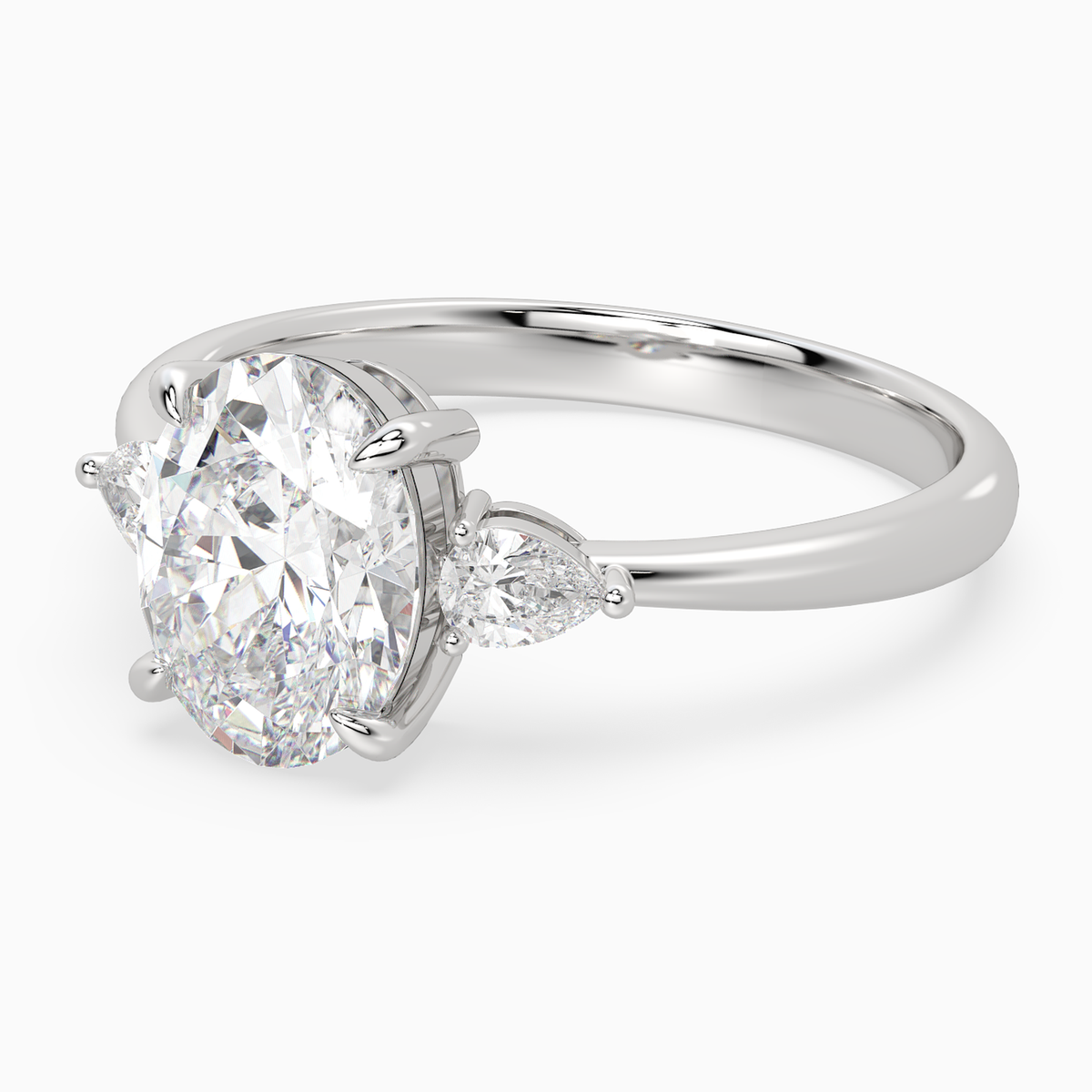 Oval Pear Side Three Stone Classic in 14K White Gold top angle