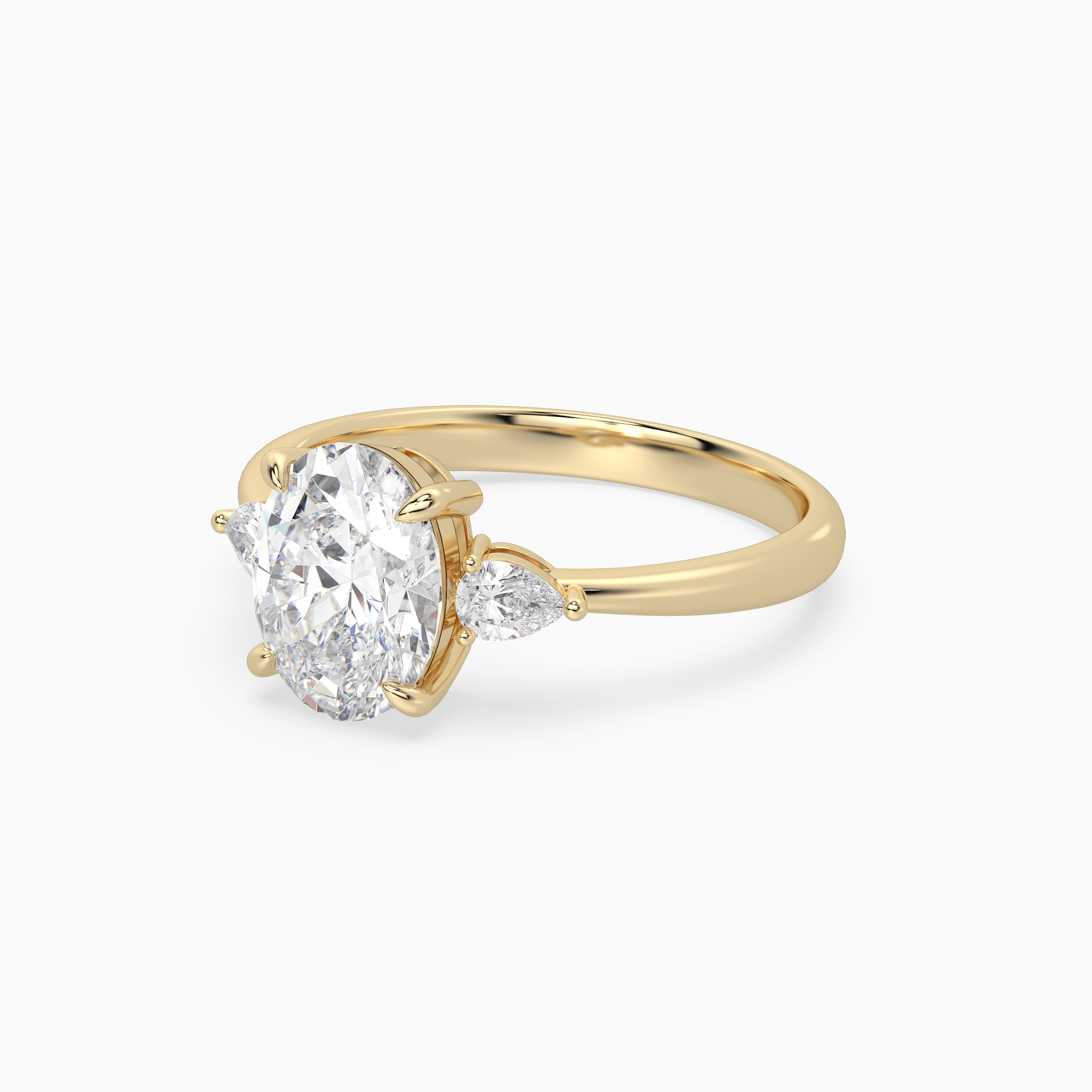 Oval Pear Side Three Stone Classic in 18K Yellow Gold top angle