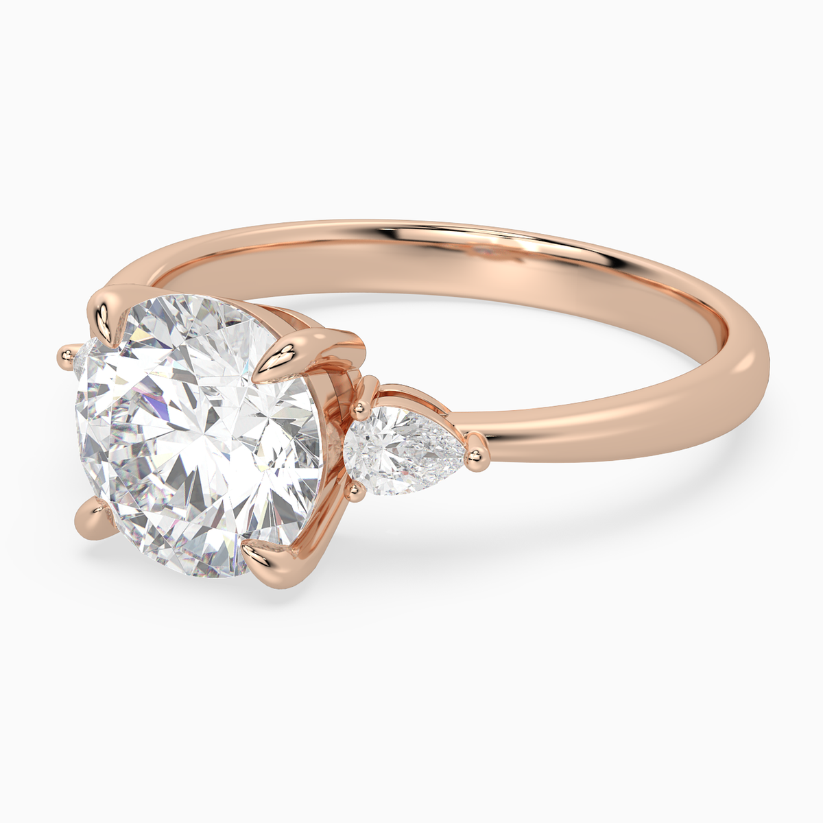 Round Pear Side Three Stone Classic in 14K Rose Gold top angle