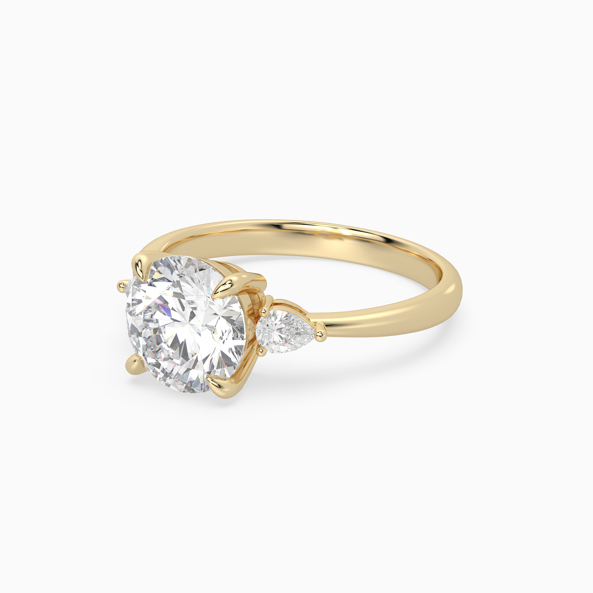 Round Pear Side Three Stone Classic in 14K Yellow Gold top angle