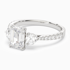 Emerald Round Side Three Stone Pavé in Platinum top angle