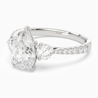 Pear Round Side Three Stone Pavé in Platinum top angle