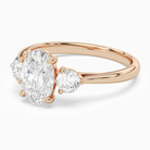 Oval Round Side Three Stone Plain in 14K Rose Gold top angle