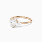 Heart Pear Three-Stone with Round Sides in 14K Rose Gold top angle