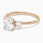 Round Pear Three-Stone with Round Sides in 14K Rose Gold top angle