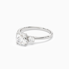 Round Pear Three-Stone with Round Sides in Platinum top angle