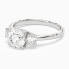 Round Round Three-Stone with Pear Sides in 18K White Gold top angle