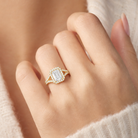 Emerald Twisted Shank Halo in 14K Yellow Gold wearing