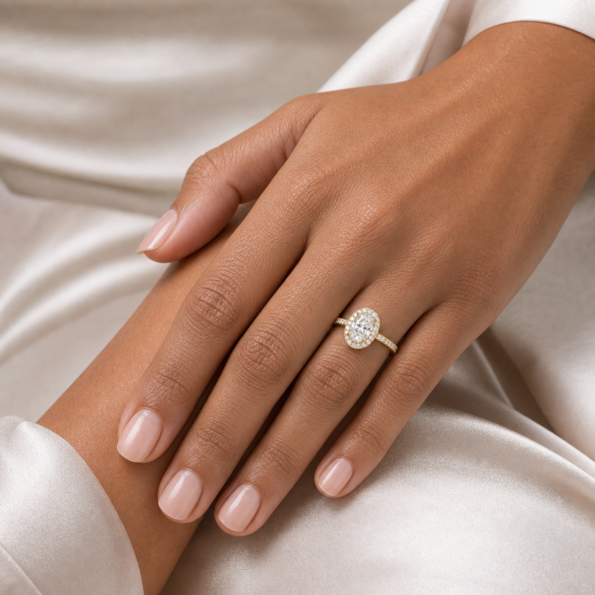 Oval Regal Halo Pavé in 18K Yellow Gold wearing