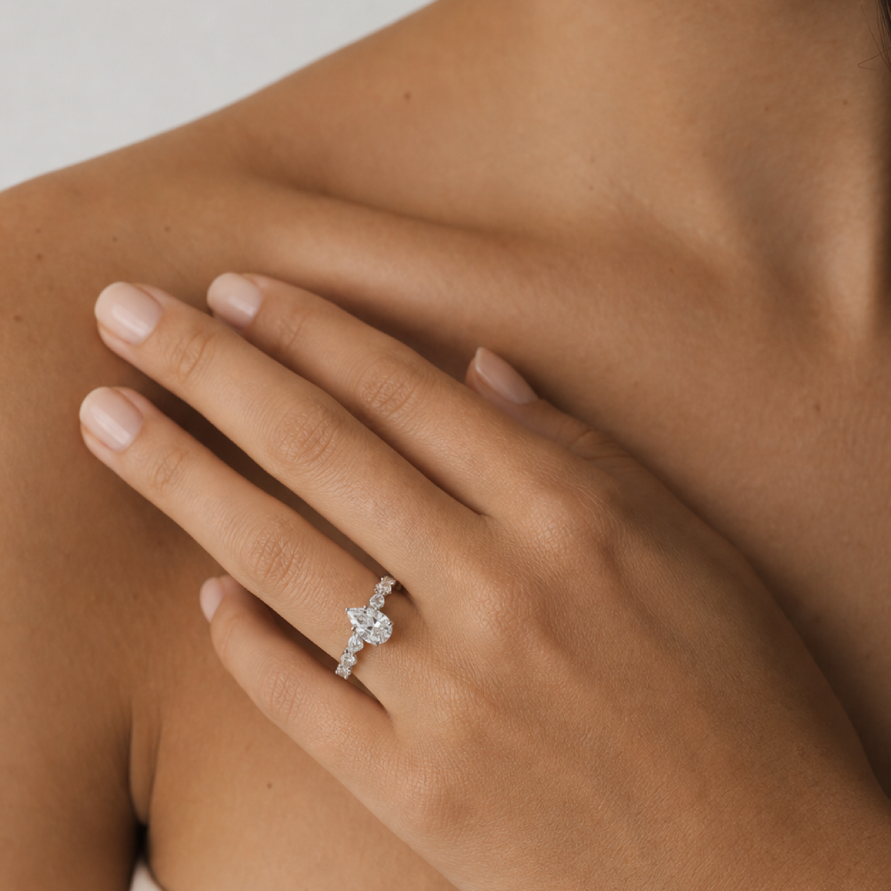 Pear Crescent Pear Side Stone in Platinum wearing