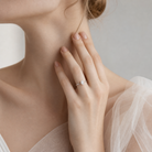 Oval Petite Classic Solitaire in 14K White Gold wearing