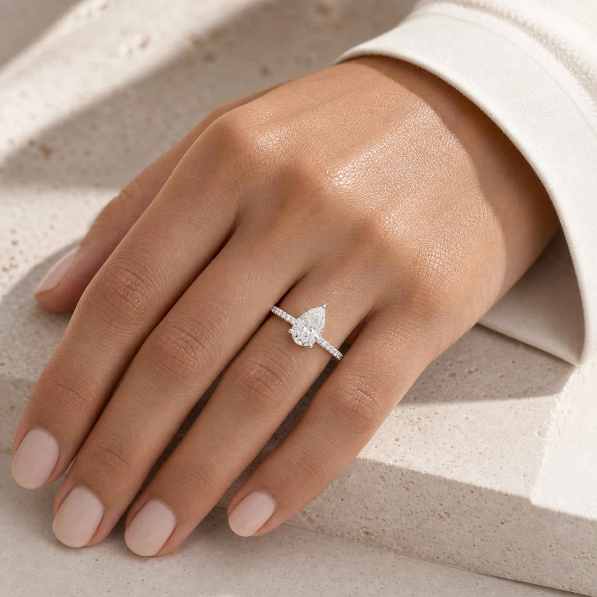 Pear Hidden Halo Crown Pavé in Platinum wearing