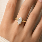 Marquise Tapered Solitaire in 18K Yellow Gold wearing