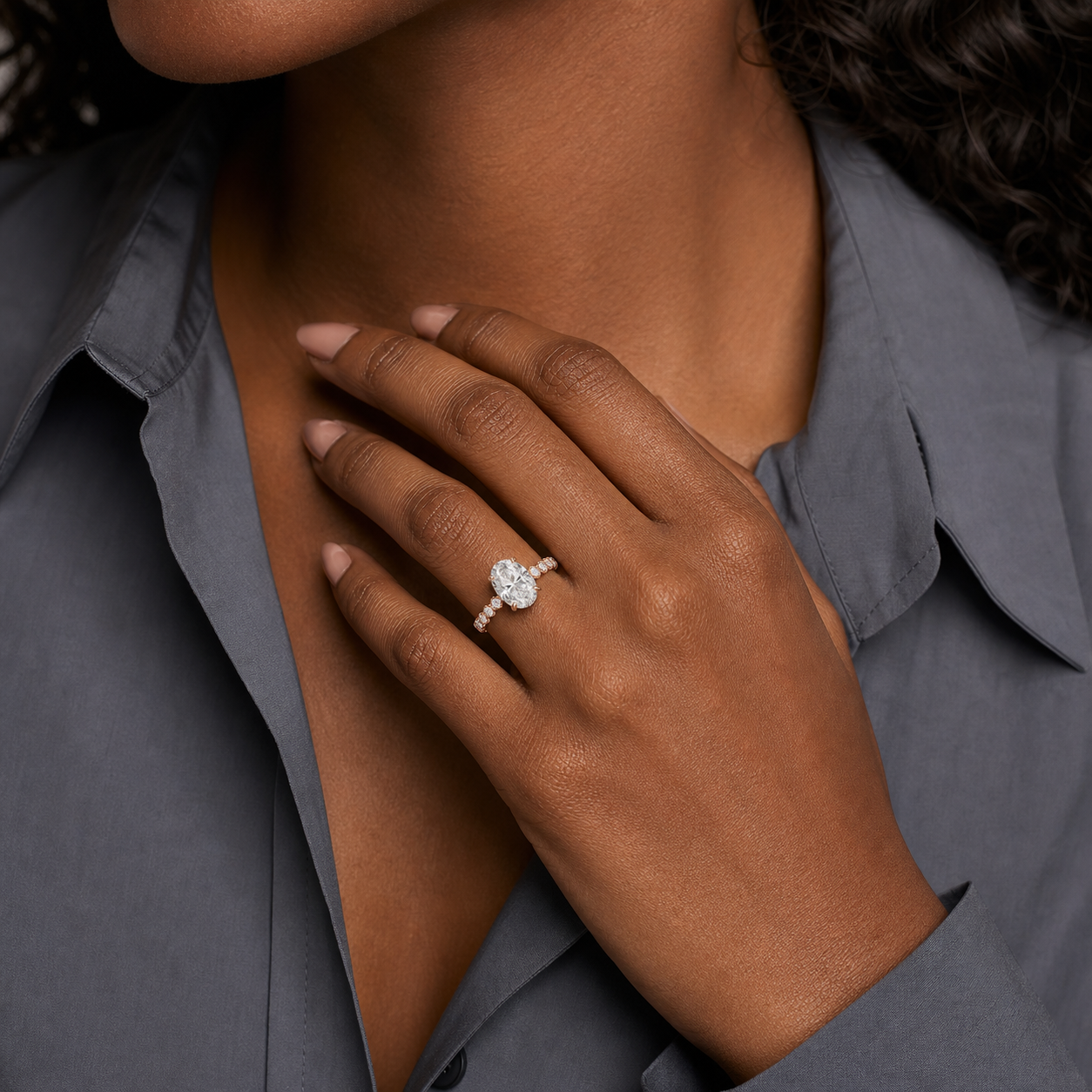 Oval Accent Shoulder Solitaire in 14K Rose Gold wearing