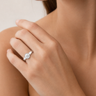 Round Wide Tapered Bezel Solitaire in 18K White Gold wearing