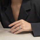 Emerald East-West Bezel Solitaire in 14K White Gold wearing