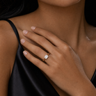 Emerald East-West Bezel Solitaire in 14K Yellow Gold wearing