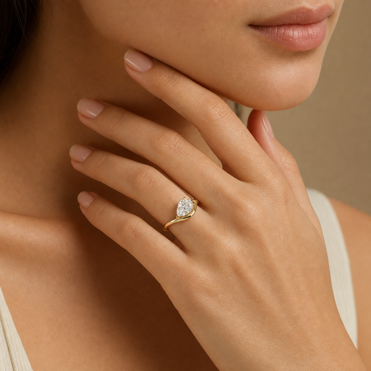 Pear Soft Bypass Solitaire in 14K Yellow Gold wearing