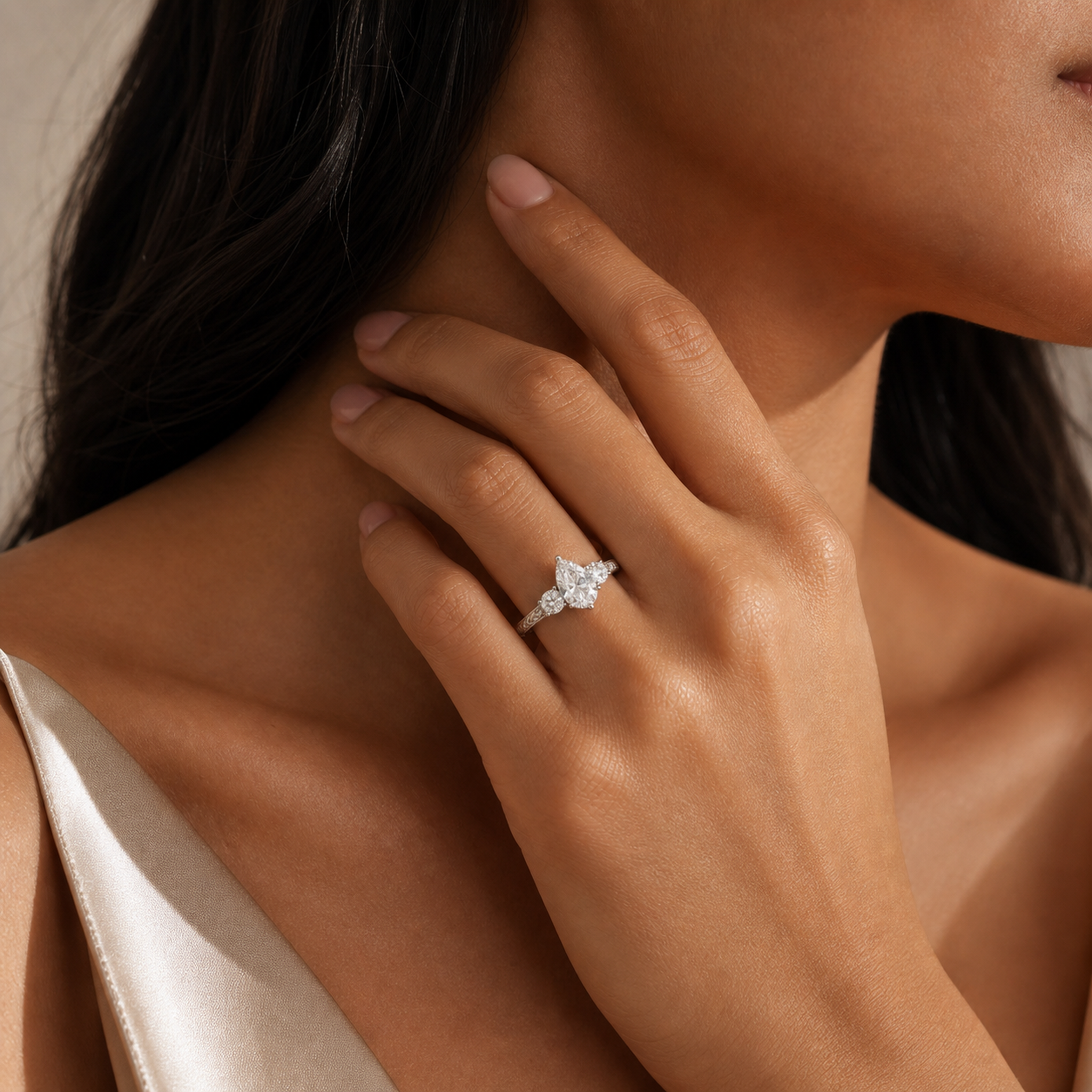 Pear Engraved Vintage Three Stone in 18K White Gold wearing