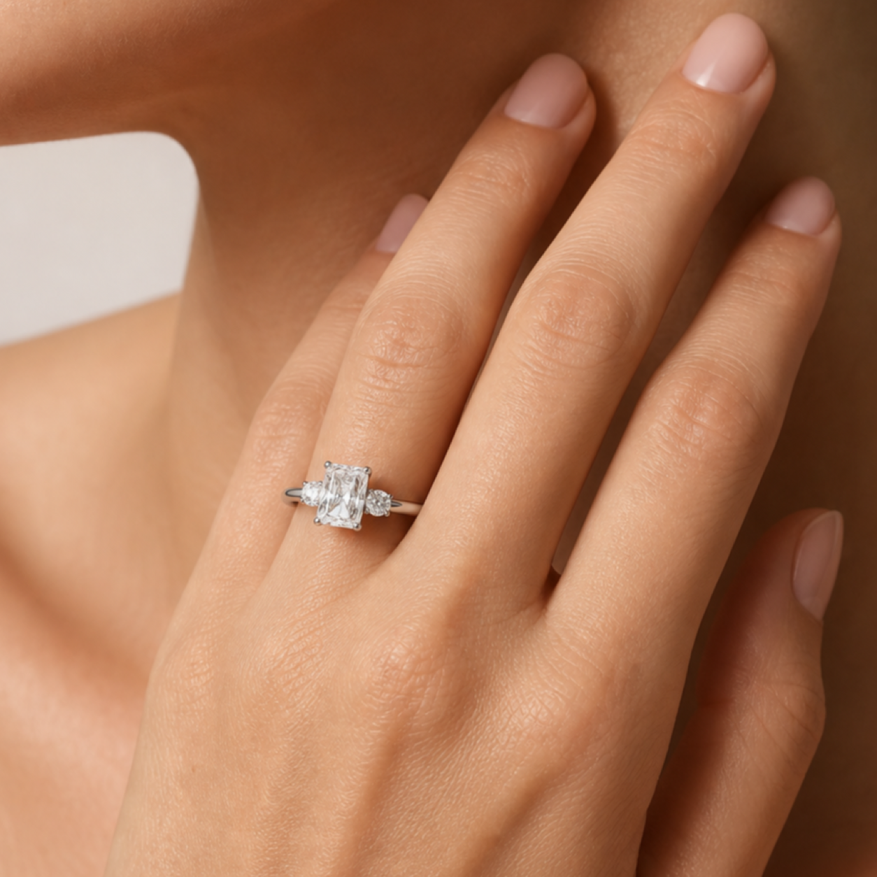 Radiant Classic Round Three Stone Small Sides in Platinum wearing