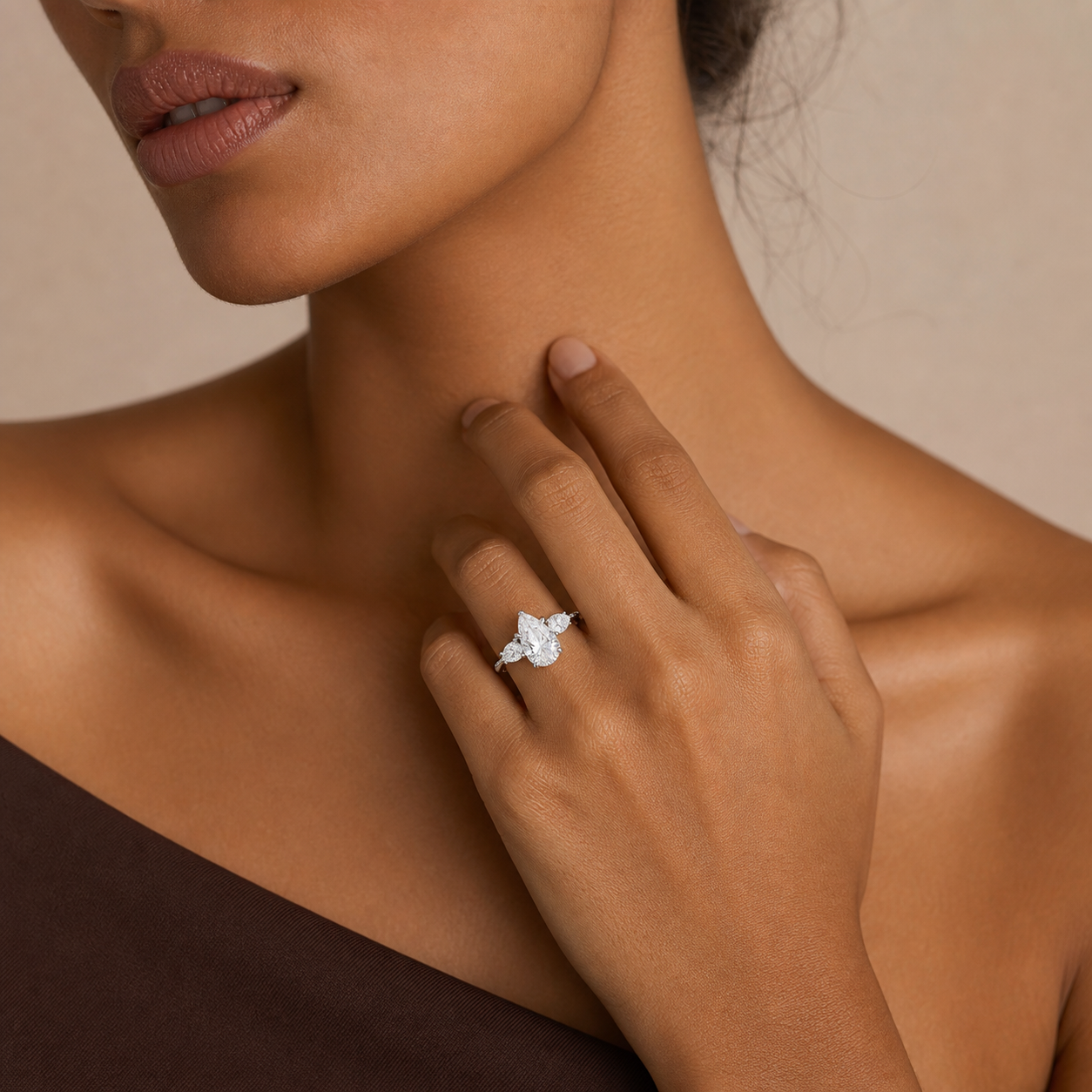 Pear Ornate Accented Three Stone in Platinum wearing