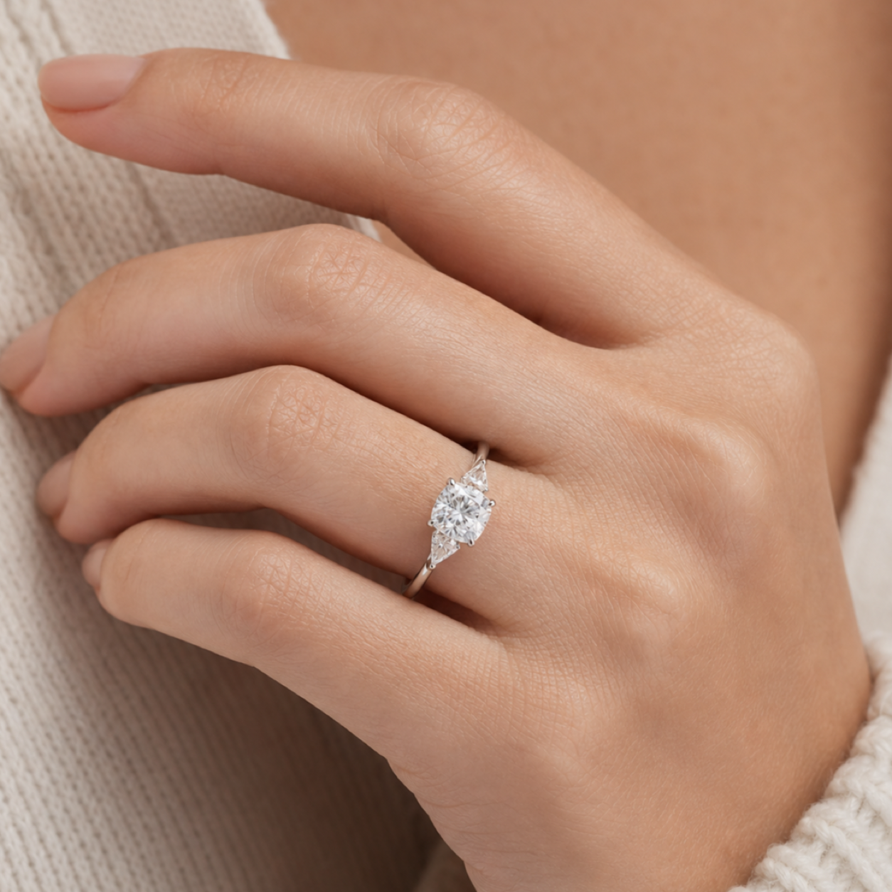 Cushion Kite Side Three Stone Large Sides in Platinum wearing