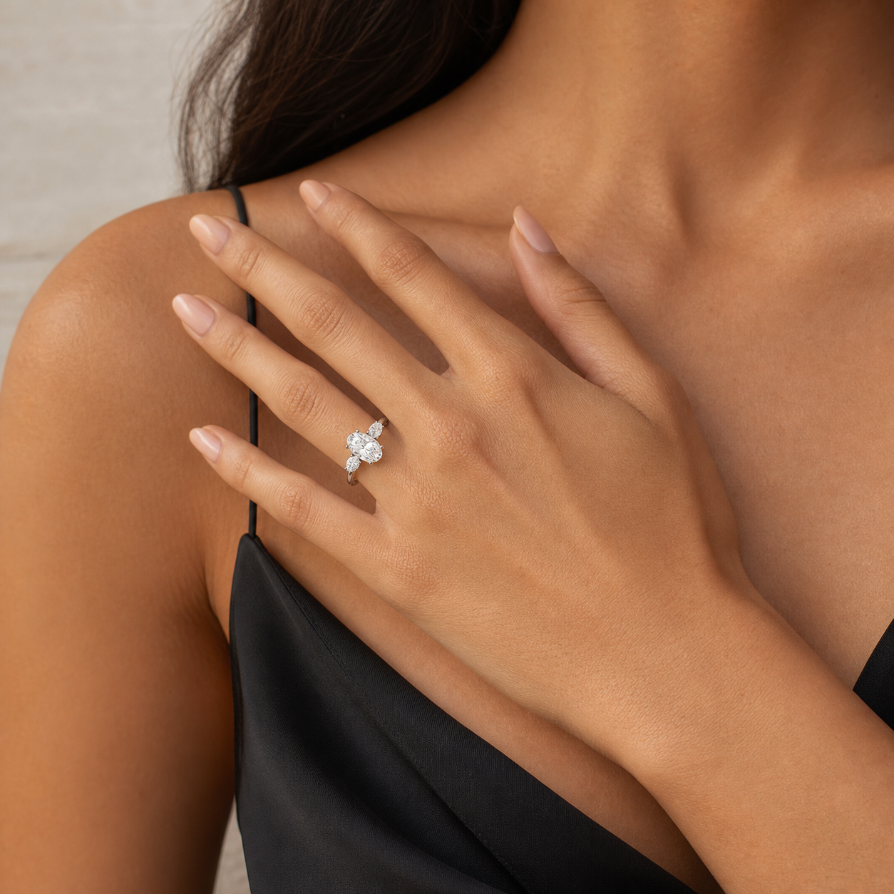 Oval Classic Three Stone in 18K White Gold wearing
