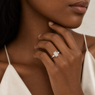 Emerald Pear Side Three Stone Classic in 14K Rose Gold wearing