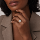 Emerald Round Side Three Stone Pavé in Platinum wearing