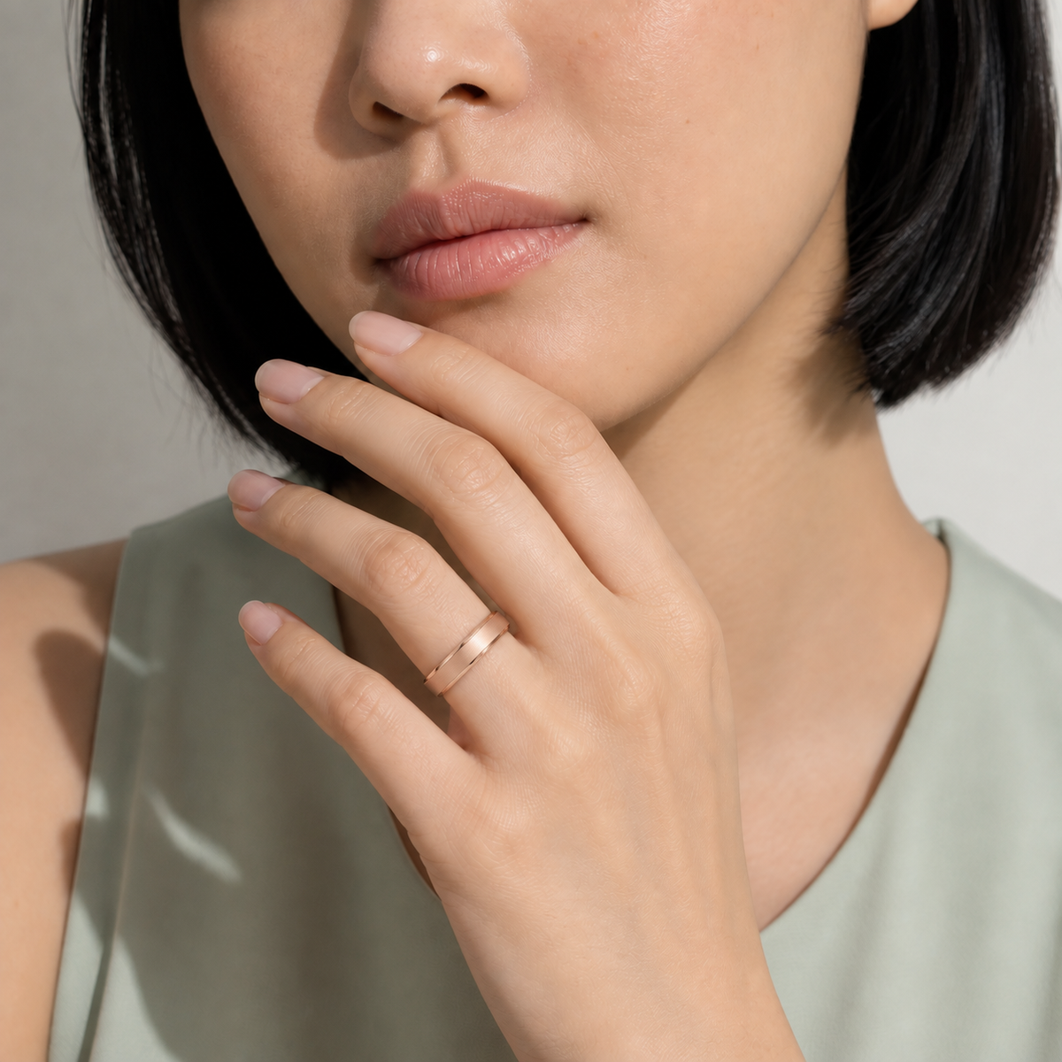Orla Brushed Beveled Edge Lab-Grown Diamond Wedding Band in 14K Rose Gold, worn on hand