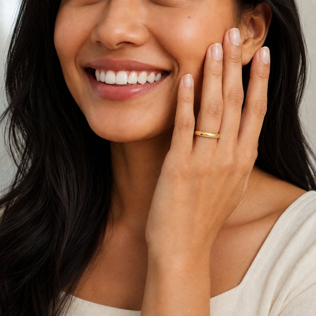 Linnea Classic Dome Wedding Band in 14K Yellow Gold, worn on hand