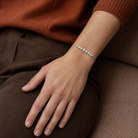 Aveline Brilliant Graduated Curve Lab-Grown Diamond Bracelet in Platinum, worn on wrist
