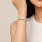 Astraea Brilliant Eternity Lab-Grown Diamond Bangle Bracelet in 14K White Gold, worn on wrist