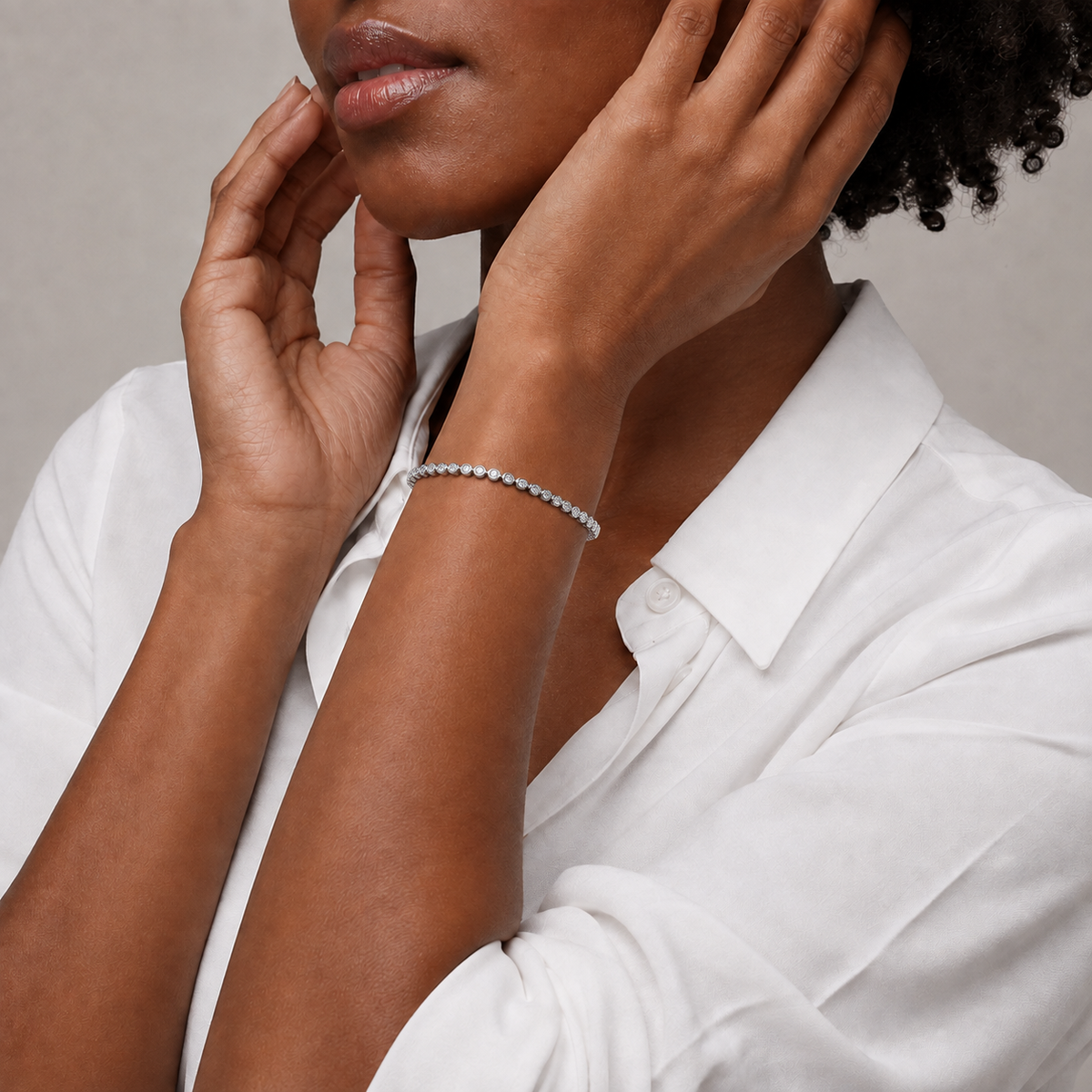 Faye Brilliant Bezel Lab-Grown Diamond Tennis Bracelet in Platinum, worn on wrist