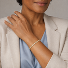Oriana Infinity Interlocking Brilliant Lab-Grown Diamond Tennis Bracelet in 14K Yellow Gold, worn on wrist