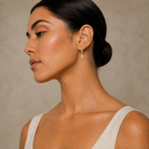 Fiorella Emerald Accented Drop Huggie Hoop Lab-Grown Diamond Earrings in 14K Rose Gold, worn on ear