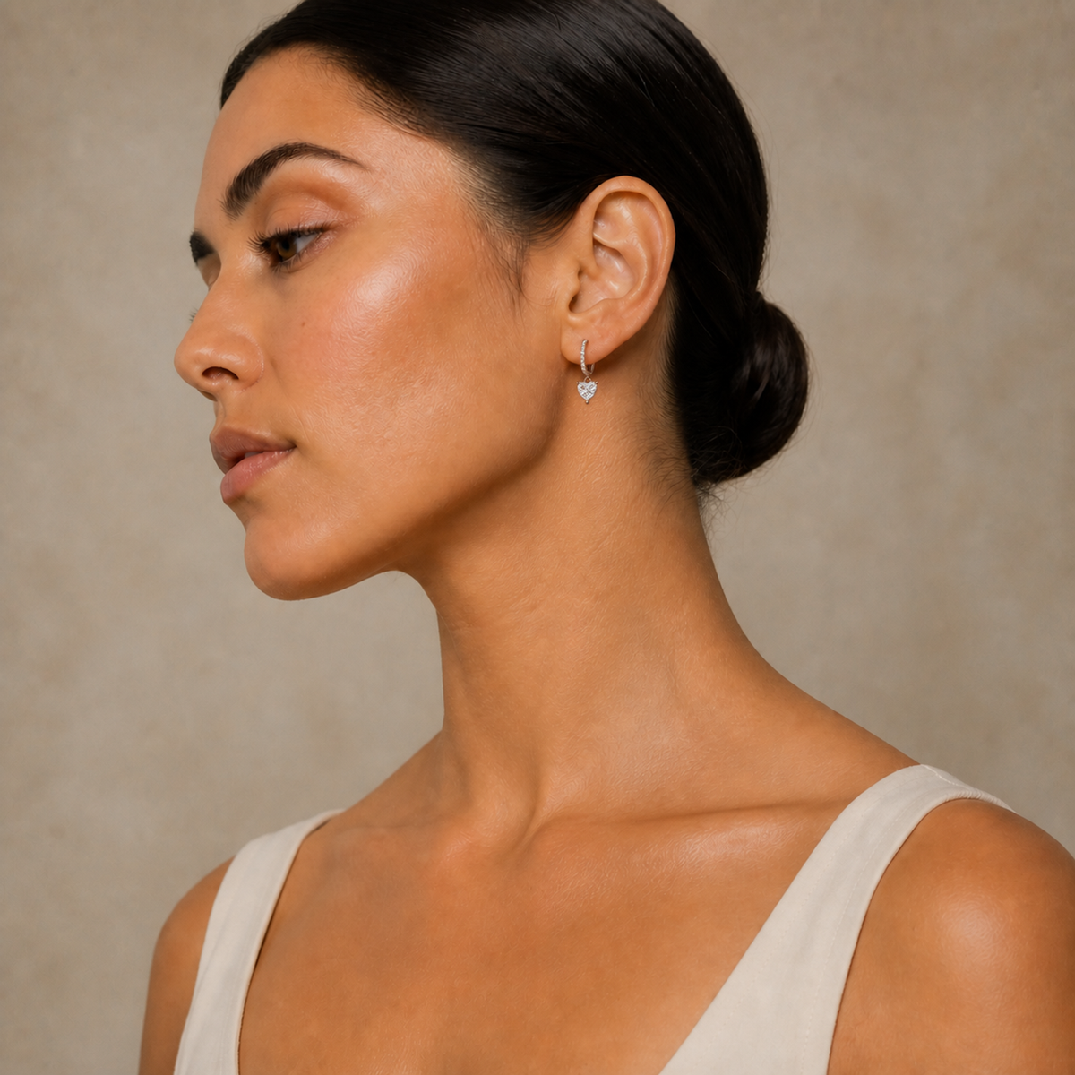 Fiorella Heart Accented Drop Huggie Hoop Lab-Grown Diamond Earrings in 14K Rose Gold, worn on ear