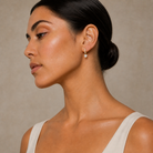Fiorella Heart Accented Drop Huggie Hoop Lab-Grown Diamond Earrings in 18K Yellow Gold, worn on ear