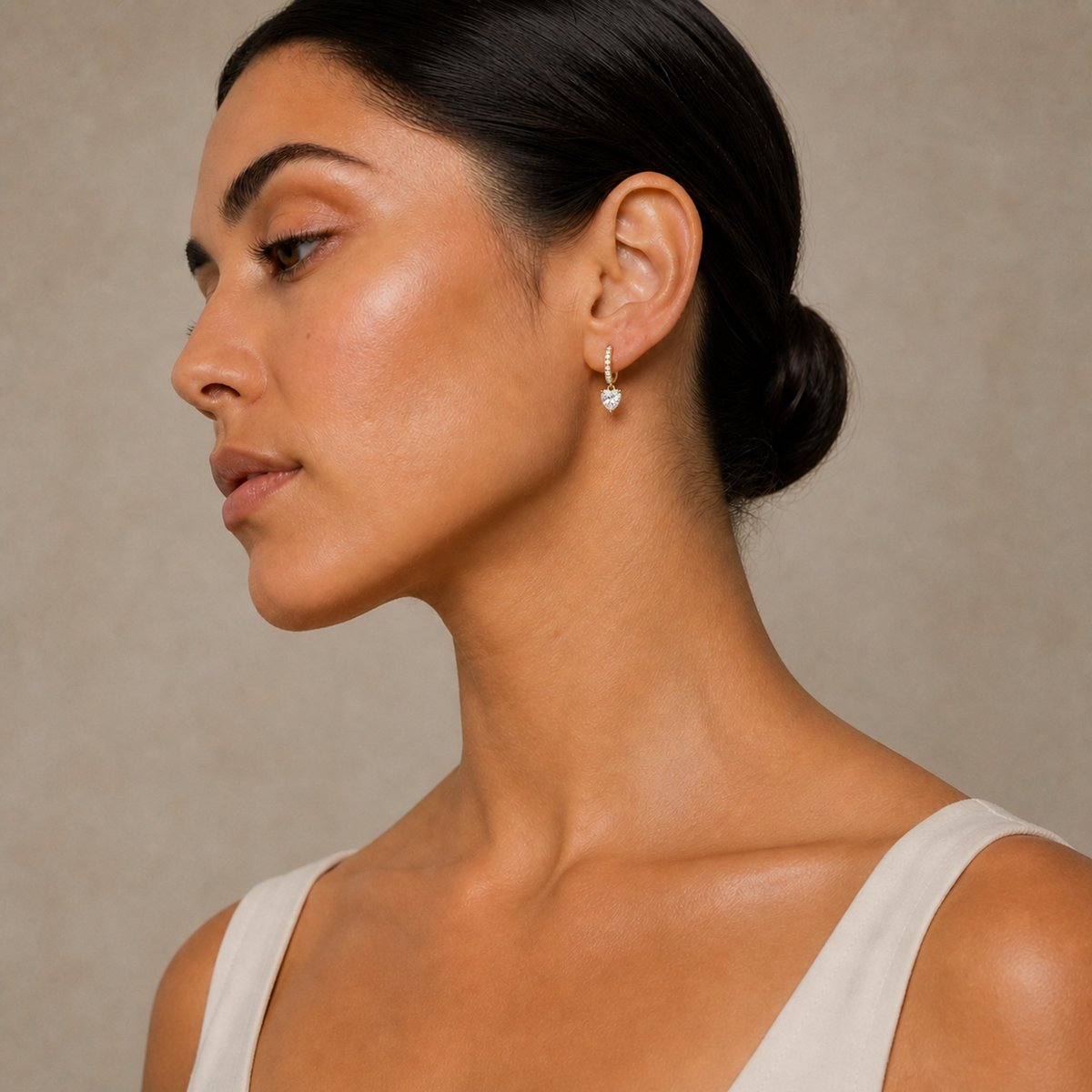 Fiorella Heart Accented Drop Huggie Hoop Lab-Grown Diamond Earrings in 14K Yellow Gold, worn on ear