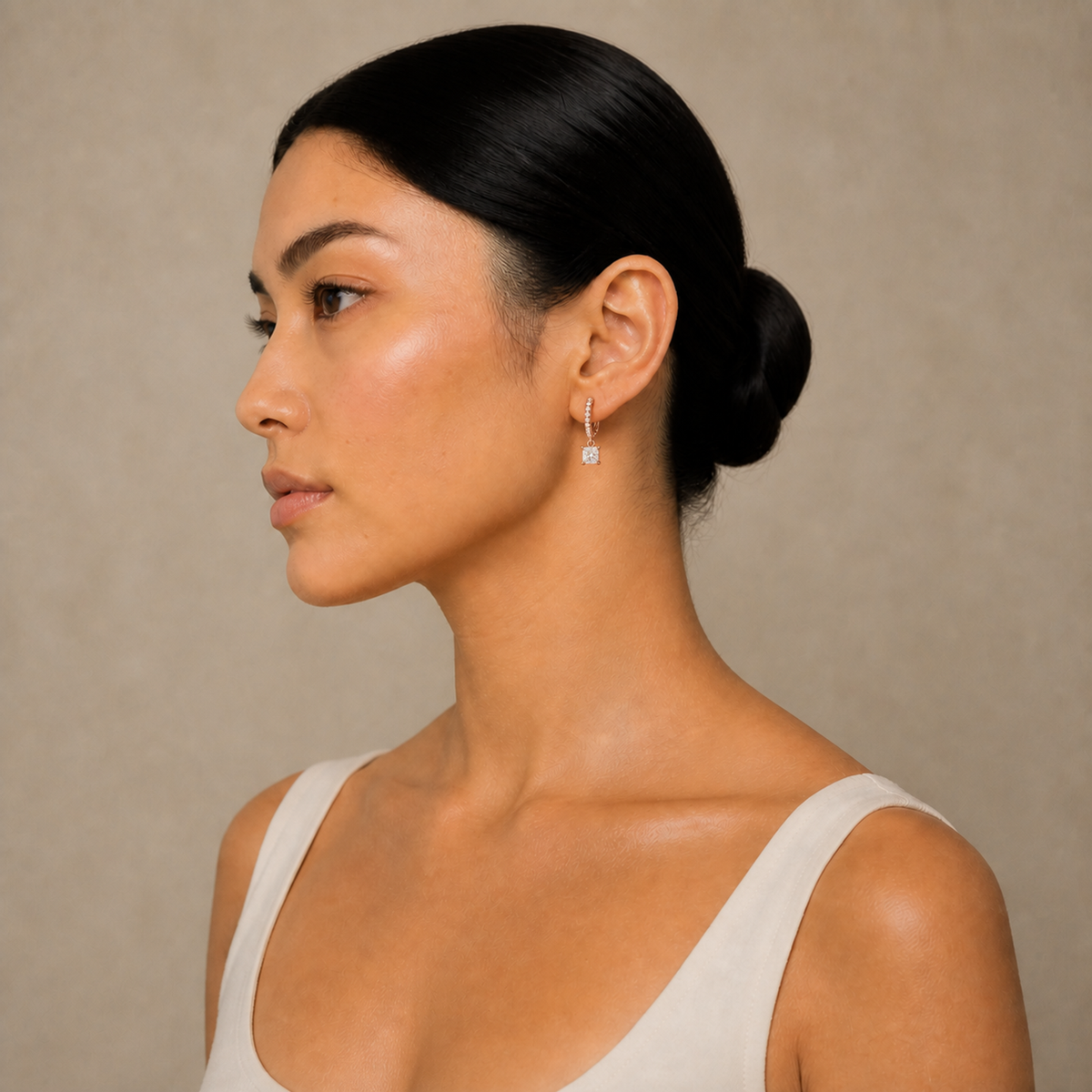 Fiorella Princess Accented Drop Huggie Hoop Lab-Grown Diamond Earrings in 14K Rose Gold, worn on ear