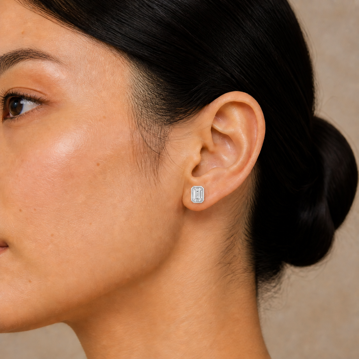 Jolie Emerald Bezel Solitaire Lab-Grown Diamond Stud Earrings in 14K White Gold, worn on ear