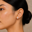 Jolie Marquise Bezel Solitaire Lab-Grown Diamond Stud Earrings in 18K White Gold, worn on ear