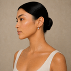 Giselle Asscher Bezel Drop Huggie Hoop Lab-Grown Diamond Earrings in 18K White Gold, worn on ear